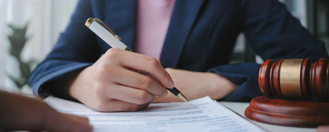 Trust administration attorney in St Petersburg Florida filling out trust documents.