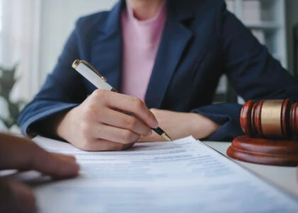 Trust administration attorney in St Petersburg Florida filling out trust documents.