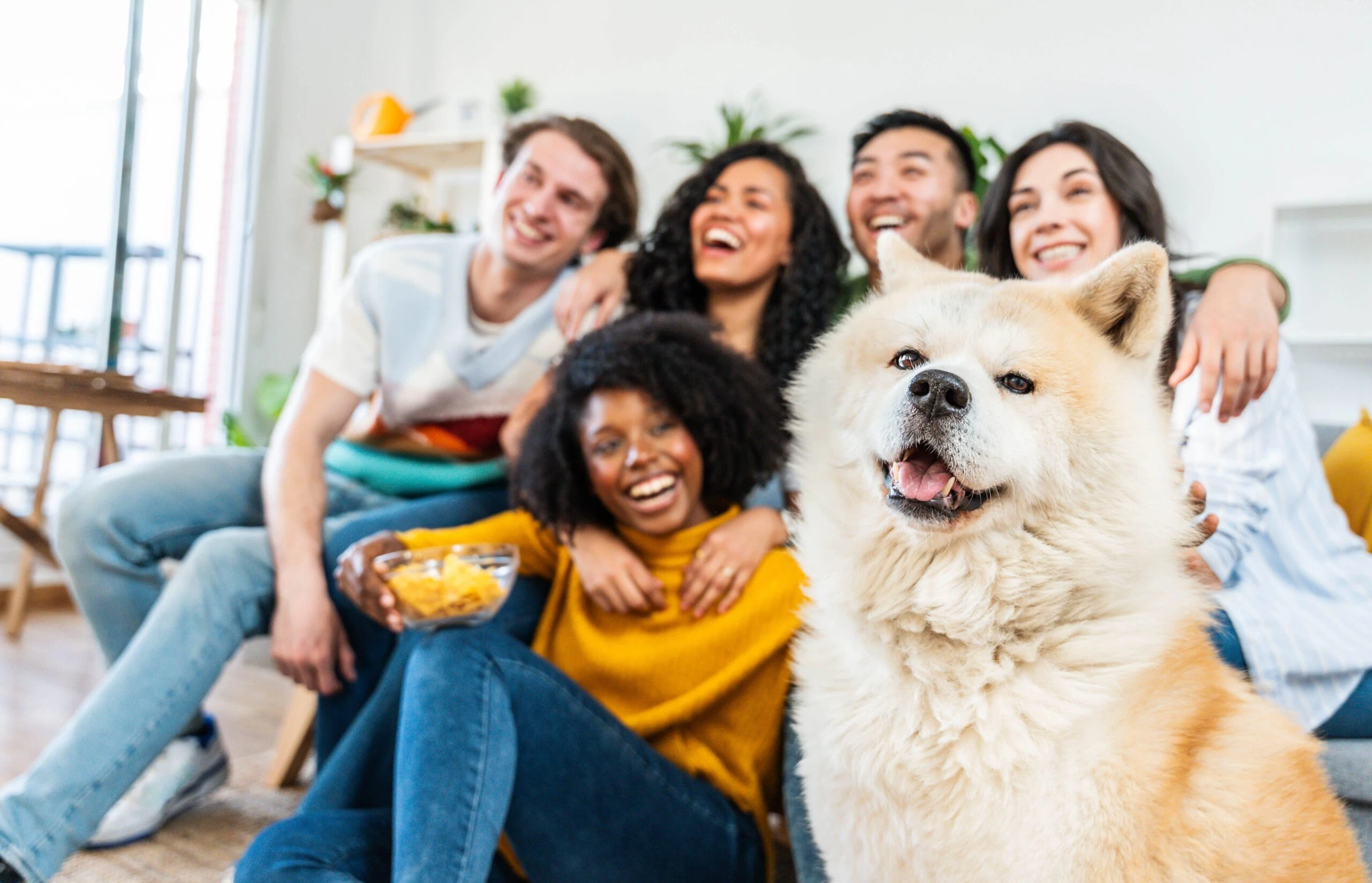 Blended famlily hanging out with dog. 